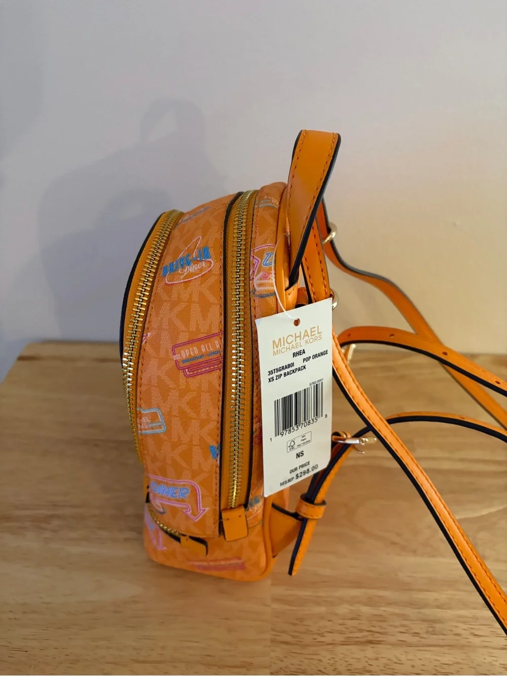Michael Kors Orange Patterned Mini Backpack